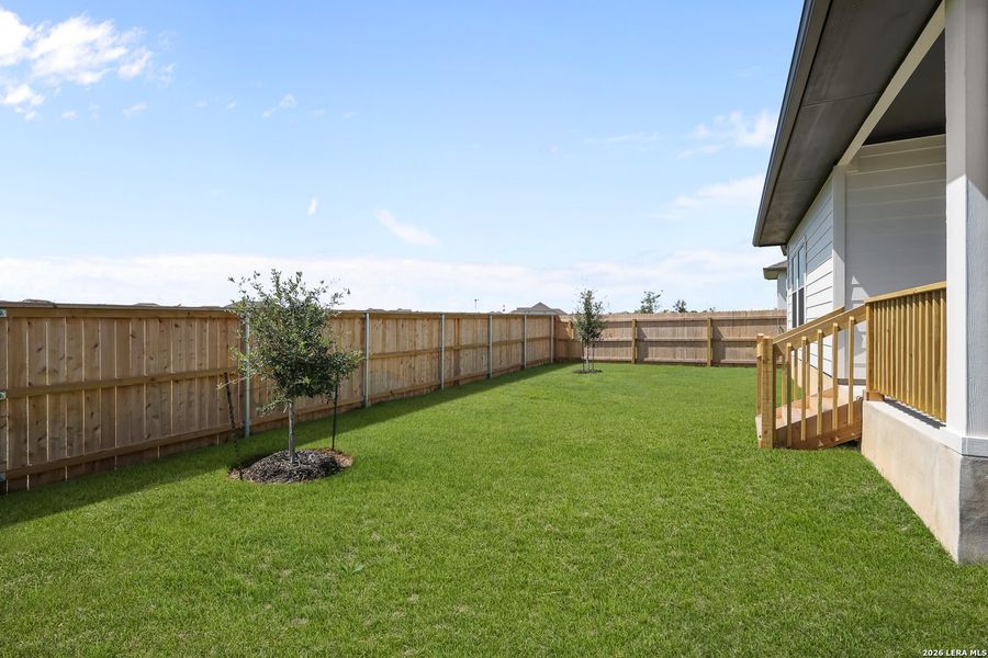 Exterior details and patio area of a home in The Parklands, Schertz (Image 24).