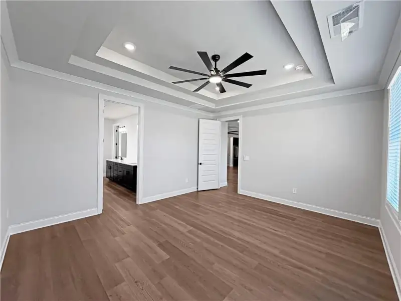 Spacious, unfurnished interior of a new home in Vines at Mill Creek - Legacy Series, Braselton (Image 28). Spacious, unfurnished interior of a new home in Vines at Mill Creek - Legacy Series, Braselton (Image 28).