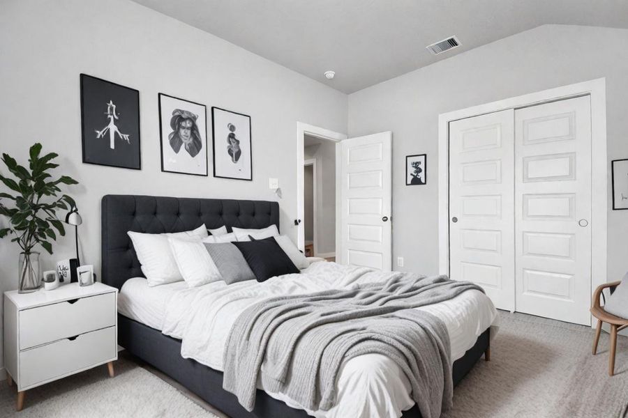 Spacious secondary bedroom with large closet. Sample photo of completed home with similar floor plan. As-built interior colors and selections may vary. Spacious secondary bedroom with large closet. Sample photo of completed home with similar floor plan. As-built interior colors and selections may vary.