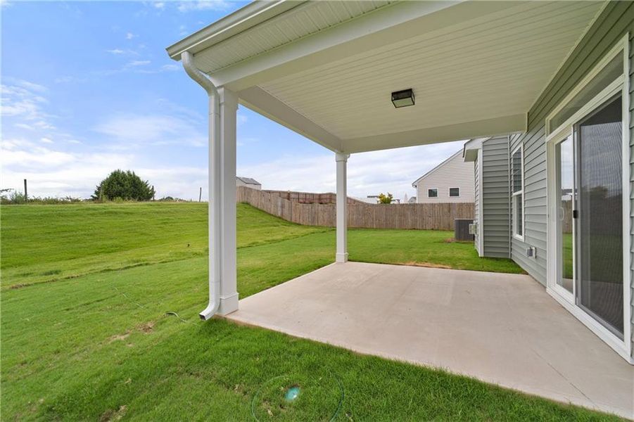 Exterior details and patio area of a home in Twin Lakes, Hoschton (Image 4).