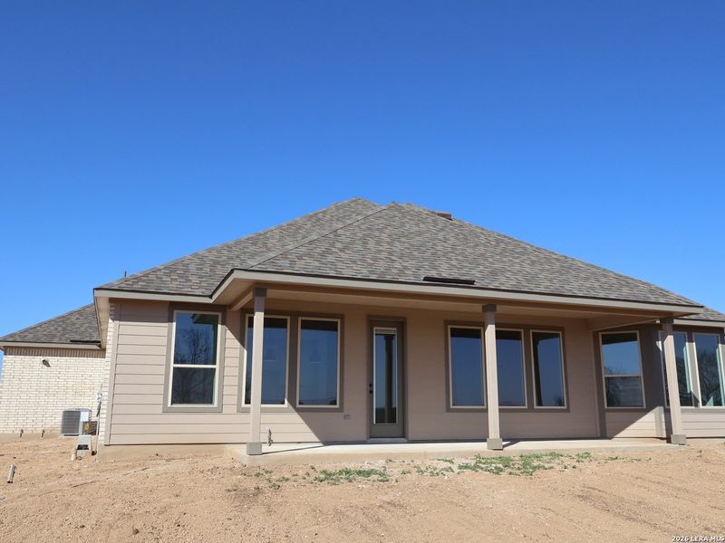 Exterior details and patio area of a home in Preserve at Annabelle Ranch, San Antonio (Image 3).