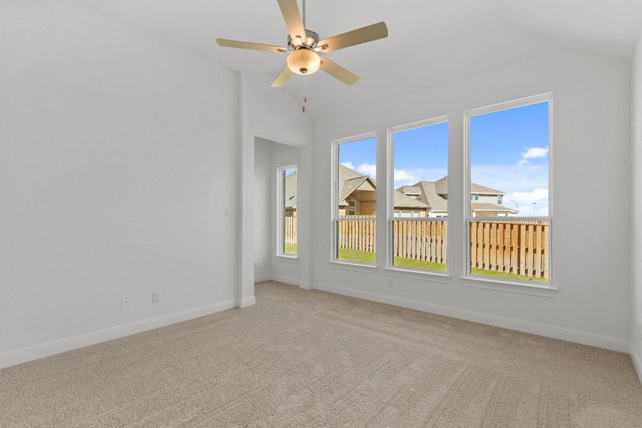 Primary Bedroom with elevated ceiling