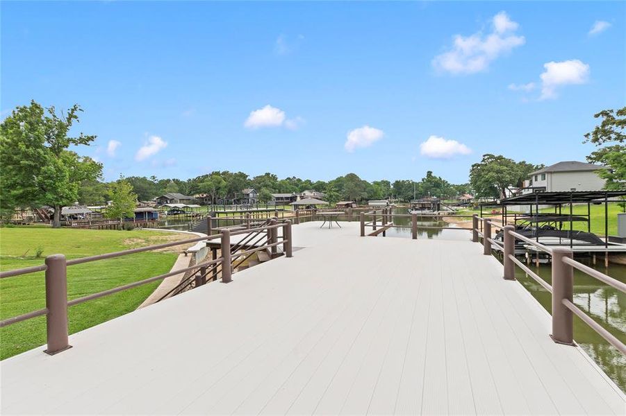 Oversized cool deck composite party deckcool deck party deck with lake views—ready for summer gatherings or quiet evenings on the water.
