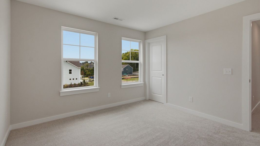Closet next to windows in spacious secondary room Closet next to windows in spacious secondary room