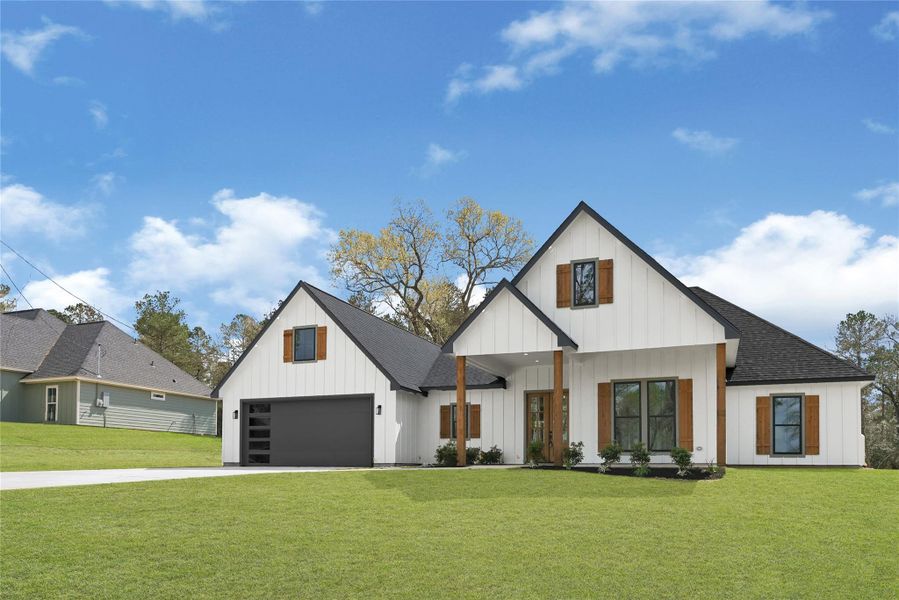 Front exterior of a new home in , Plantersville, TX, highlighting curb appeal (Image 21).