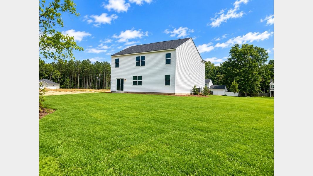 Exterior details and patio area of a home in Cypress Landing, Hardeeville (Image 3).