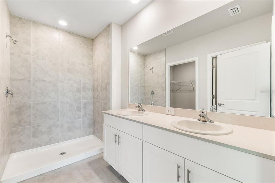 Furnished interior view inside a new home in Cove at West Port - Tradition, Port Charlotte (Image 26).