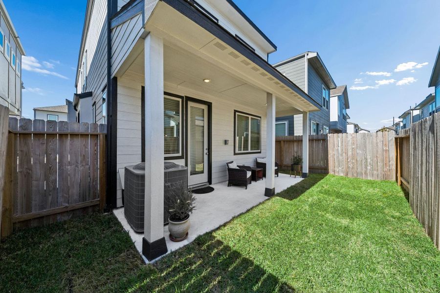 Exterior details and patio area of a home in Spring Brook Village - City Series, Houston (Image 3).