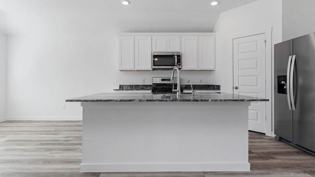 Furnished interior view inside a new home in Caldwell Crossing, Iowa Colony (Image 8). Furnished interior view inside a new home in Caldwell Crossing, Iowa Colony (Image 8).