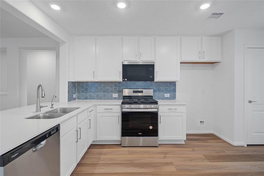 Additional view of this spacious kitchen.