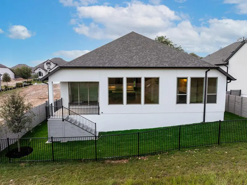 Exterior details and patio area of a home in Wolf Ranch South Fork, Georgetown (Image 3).