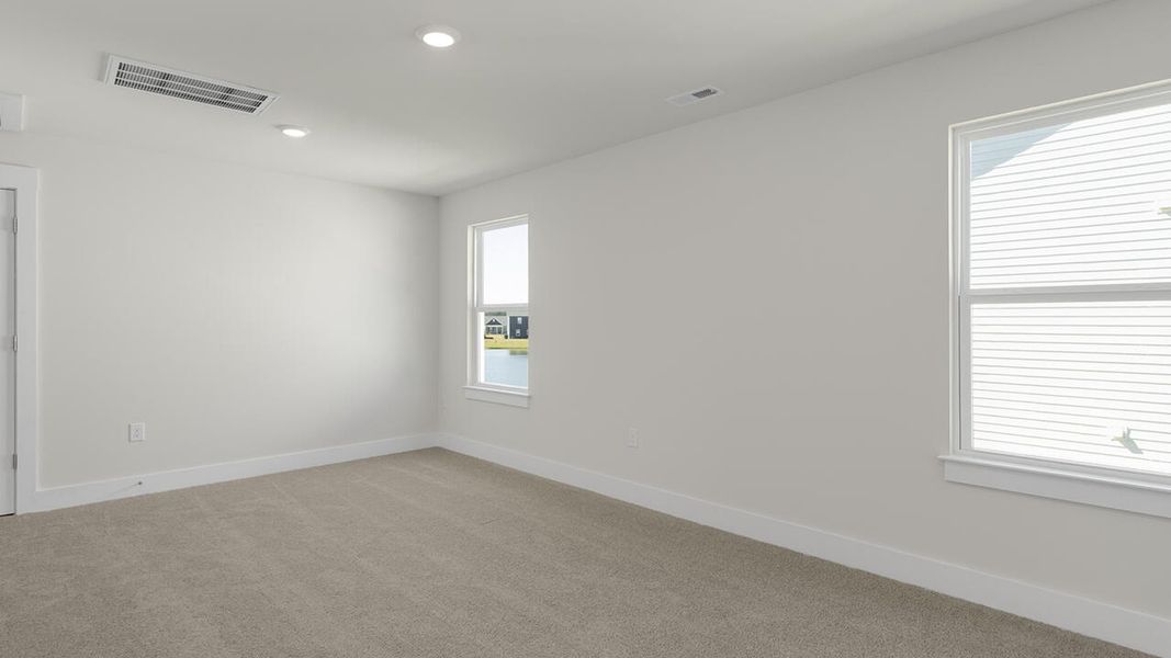 Spacious, unfurnished interior of a new home in Sidbury Station, Castle Hayne (Image 25).
