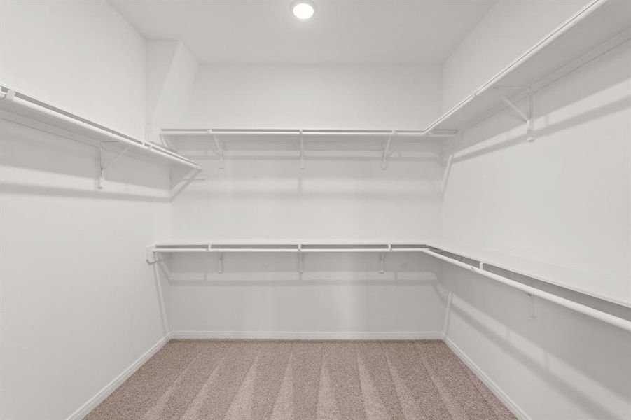 A view of your large primary walk-in Closet