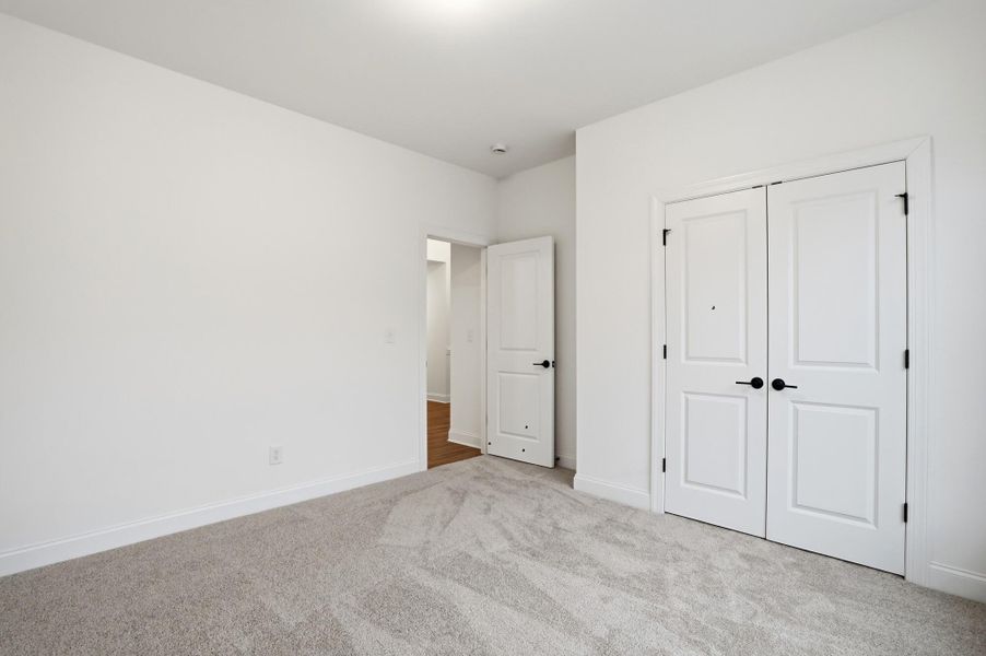 Spacious, unfurnished interior of a new home in Rone Creek, Waxhaw (Image 41).