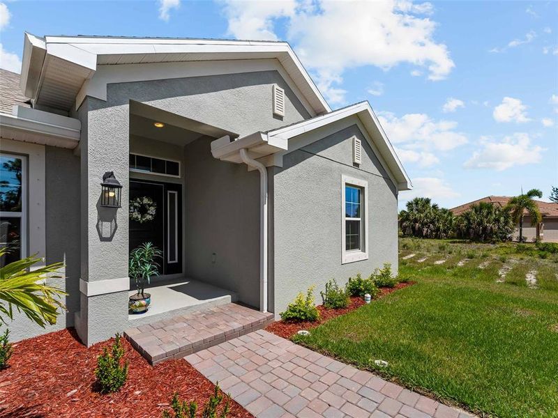 Exterior details and patio area of a home in Port Charlotte, Port Charlotte (Image 38).