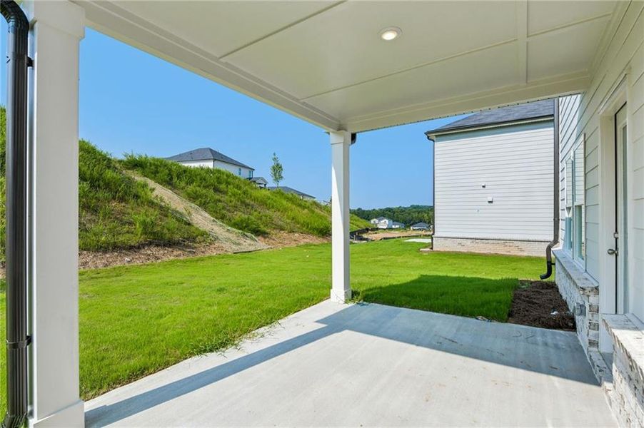 Exterior details and patio area of a home in Preserve at Mountain Creek, Pendergrass (Image 26).