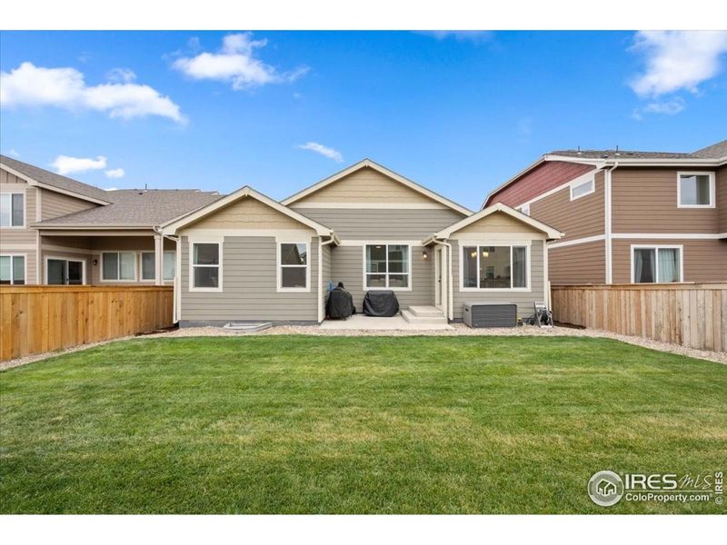 Front exterior of a new home in Hidden Valley, Severance, CO, highlighting curb appeal (Image 2).