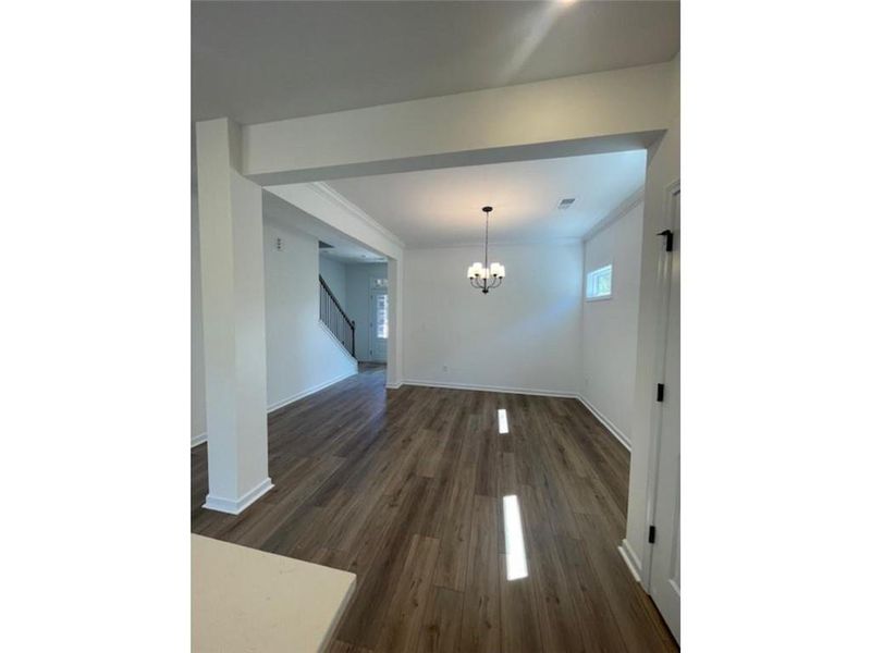 Spacious, unfurnished interior of a new home in Springwood Grove, Central (Image 12).