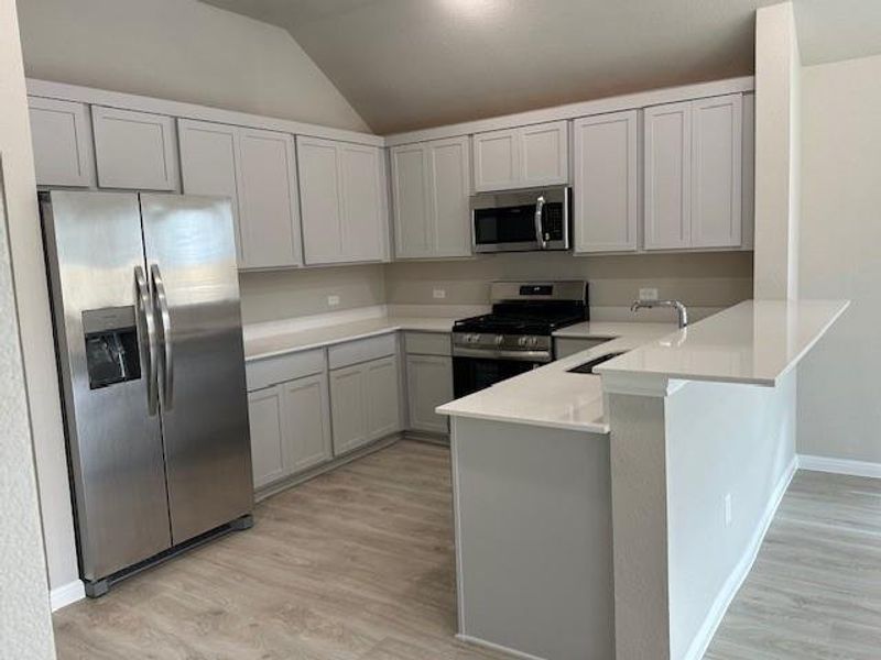 Furnished interior view inside a new home in Trinity Ranch, Elgin (Image 6).