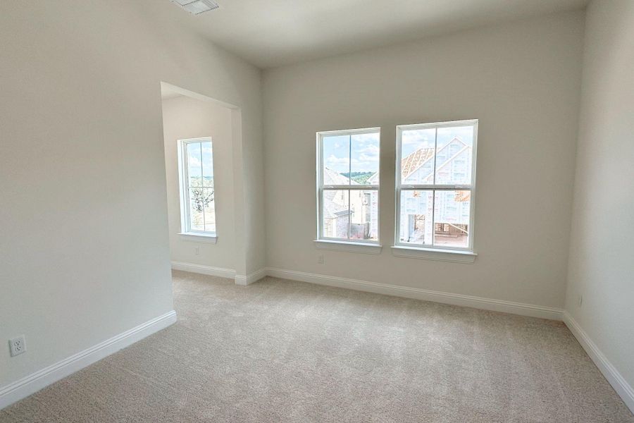 A naturally illuminated room offering a neutral canvas for your personalized interior design vision.