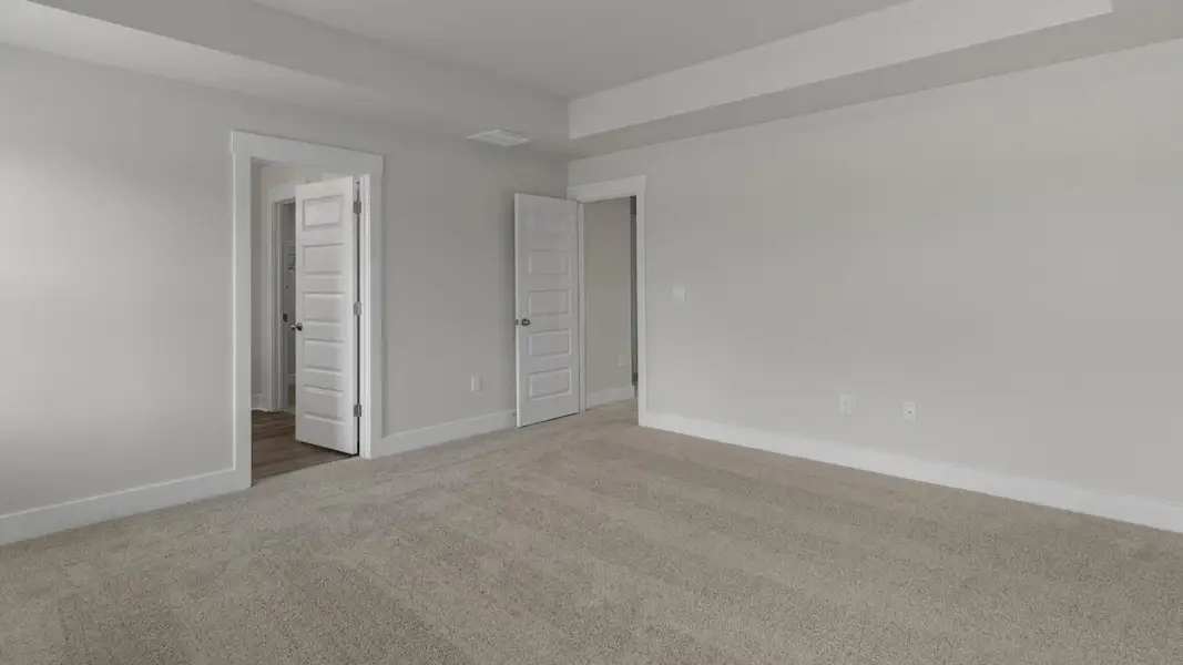 Spacious, unfurnished interior of a new home in The Highlands at Cedar Hill Landing, Navassa (Image 24).