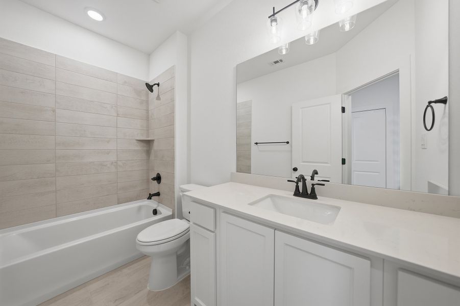 Furnished interior view inside a new home in Tavolo Park, Fort Worth (Image 14).