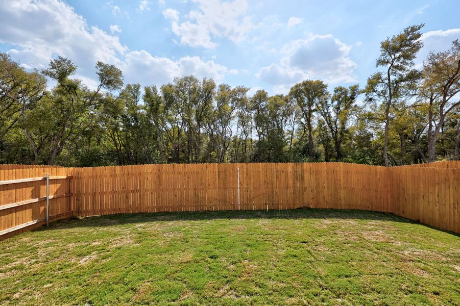 Exterior details and patio area of a home in Trinity Ranch, Elgin (Image 19).