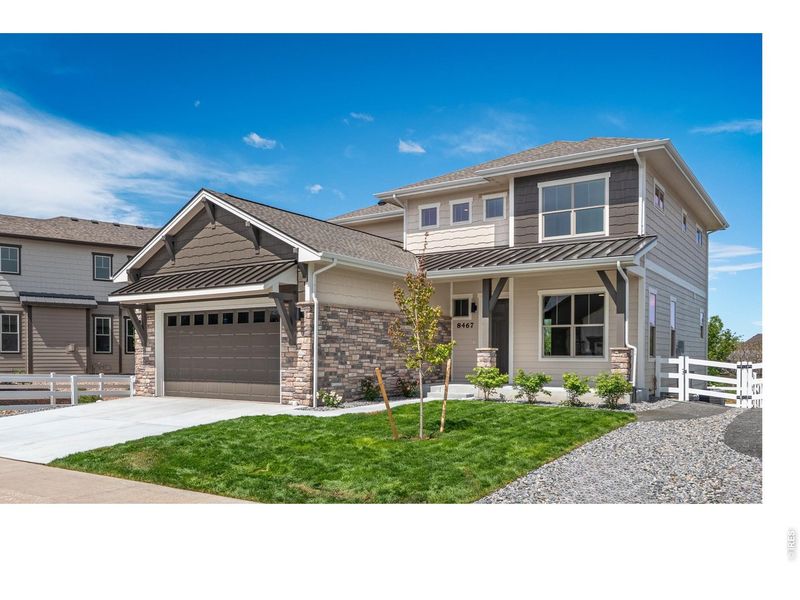 Front exterior of a new home in , Windsor, CO, highlighting curb appeal (Image 28).