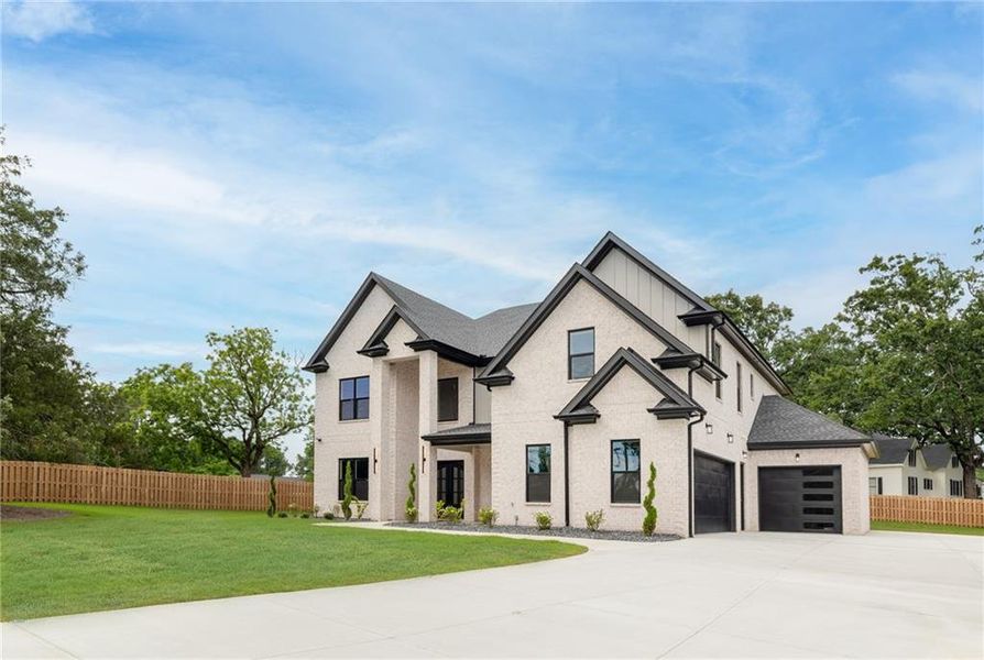 Front exterior of a new home in , Grayson, GA, highlighting curb appeal (Image 29).