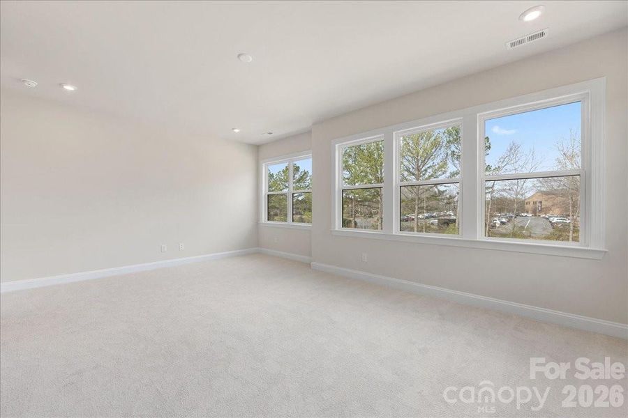 Light-filled primary bedroom