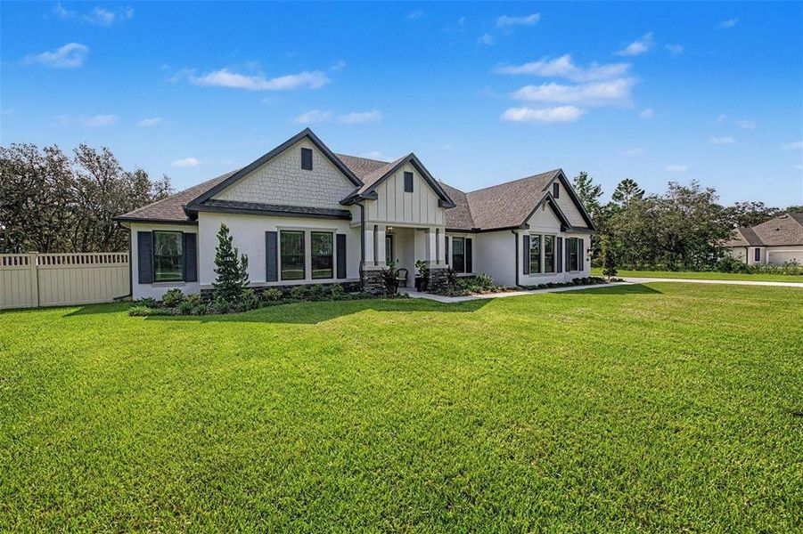 Front exterior of a new home in , Hudson, FL, highlighting curb appeal (Image 21). Front exterior of a new home in , Hudson, FL, highlighting curb appeal (Image 21).