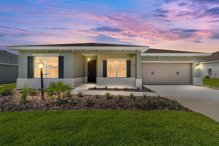Front exterior of a new home in On Top of the World Communities, Ocala, FL, highlighting curb appeal (Image 19). Front exterior of a new home in On Top of the World Communities, Ocala, FL, highlighting curb appeal (Image 19).