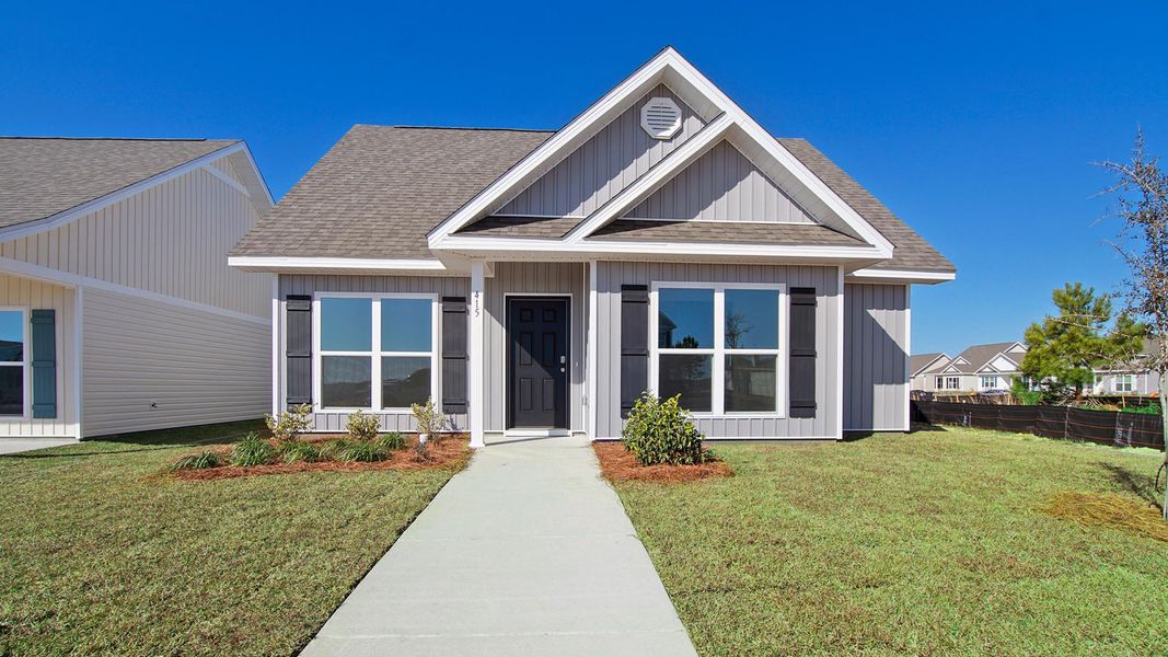 Representative exterior photo of a completed home built from the Mason by D.R. Horton in Owl's Head East, Freeport, FL (Image 1). Representative exterior photo of a completed home built from the Mason by D.R. Horton in Owl's Head East, Freeport, FL (Image 1).