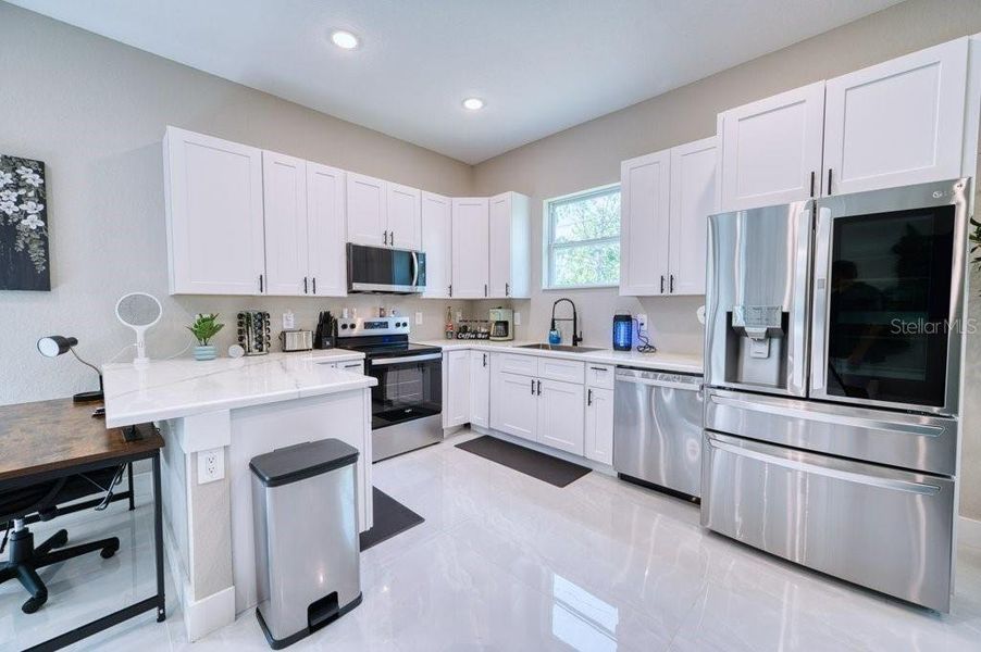 Furnished interior view inside a new home in , Port Charlotte (Image 16). Furnished interior view inside a new home in , Port Charlotte (Image 16).