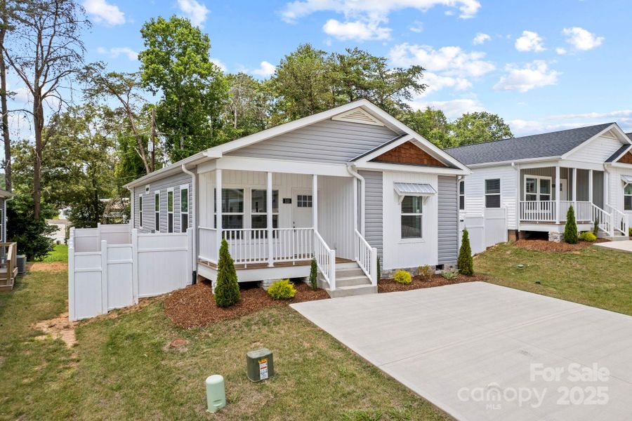 Front exterior of a new home in , Asheville, NC, highlighting curb appeal (Image 1).
