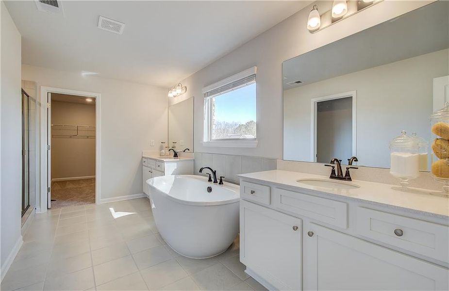 Furnished interior view inside a new home in Cambria at Traditions, Hampton (Image 30). Furnished interior view inside a new home in Cambria at Traditions, Hampton (Image 30).