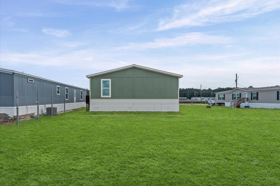 Front exterior of a new home in , Huffman, TX, highlighting curb appeal (Image 25).