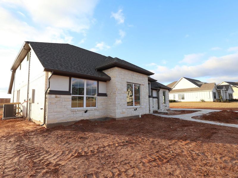 Exterior details and patio area of a home in Lone Star Landing, Montgomery (Image 3).