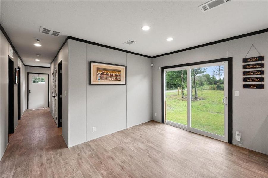 Dining room with sliding glass doors going into the back yard. Dining room with sliding glass doors going into the back yard.