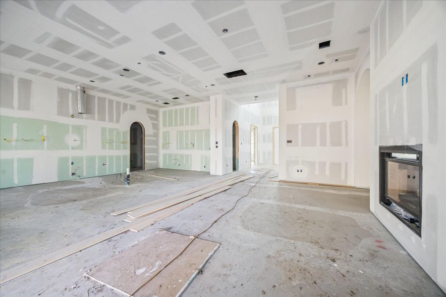 Large sliding doors connect the space to the covered patio, creating an easy transition between indoor living and outdoor entertaining, while wide sightlines keep the kitchen and dining areas fully connected. Large sliding doors connect the space to the covered patio, creating an easy transition between indoor living and outdoor entertaining, while wide sightlines keep the kitchen and dining areas fully connected.