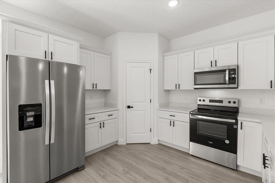 Furnished interior view inside a new home in , Dunnellon (Image 5).