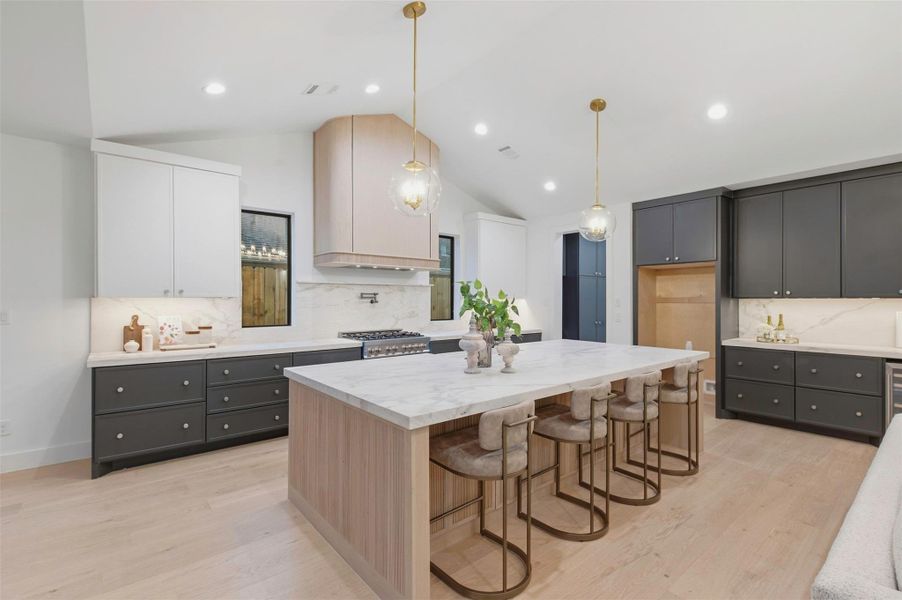 Thoughtfully designed kitchen combines extensive cabinetry, premium appliances, and elevated designer details.
