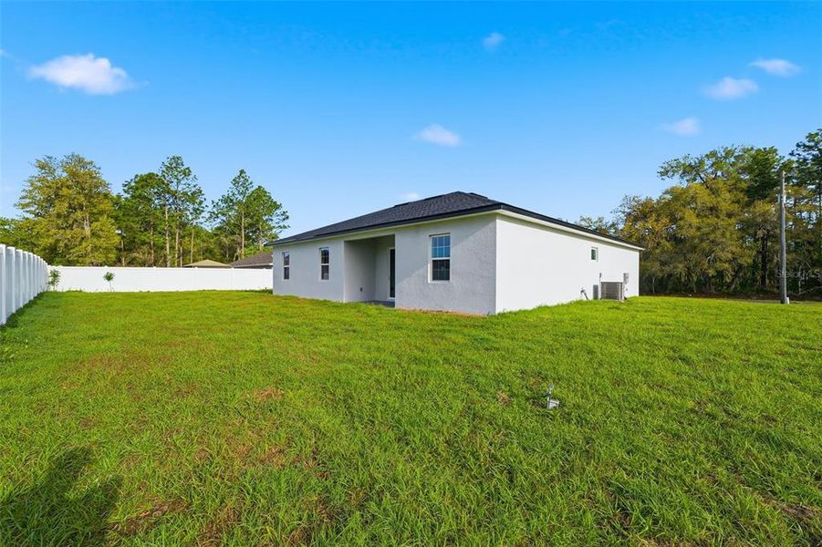 Exterior details and patio area of a home in , Ocala (Image 4).