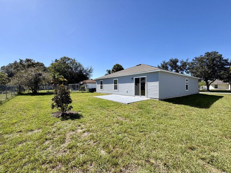 Exterior details and patio area of a home in Poinciana, Poinciana (Image 1).