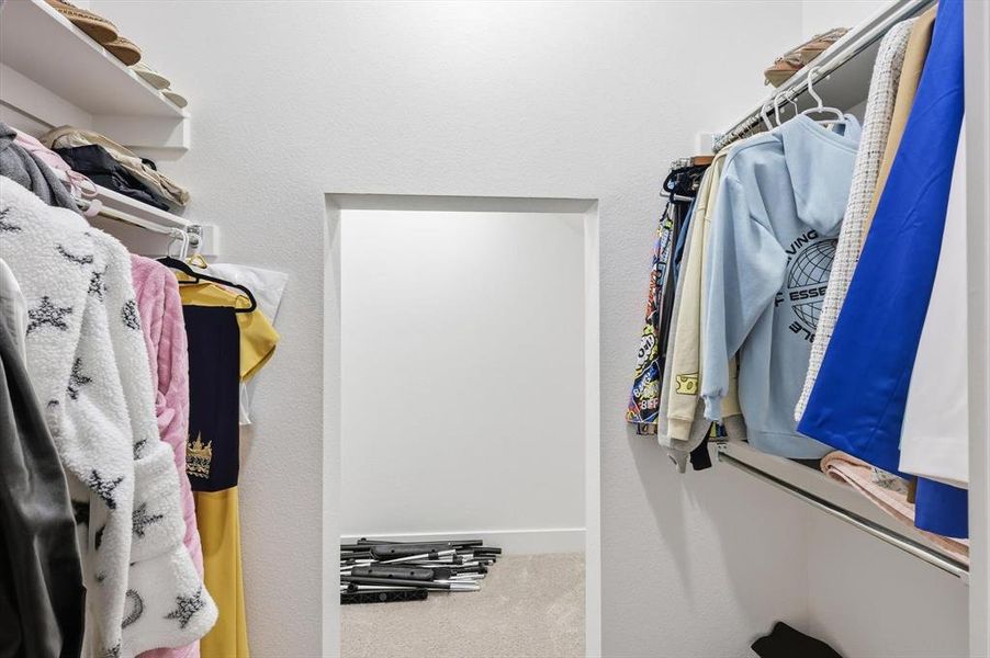 Downstairs bedroom closet with TONS of extra storage space Downstairs bedroom closet with TONS of extra storage space