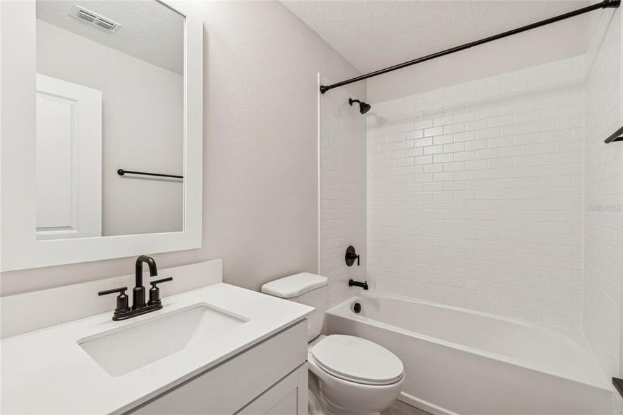 Furnished interior view inside a new home in Aspire at Canter Creek, Davenport (Image 8).