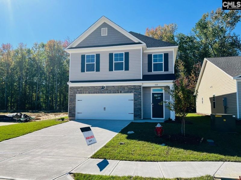 Front exterior of a new home in Blythewood Farms, Blythewood, SC, highlighting curb appeal (Image 1). Front exterior of a new home in Blythewood Farms, Blythewood, SC, highlighting curb appeal (Image 1).