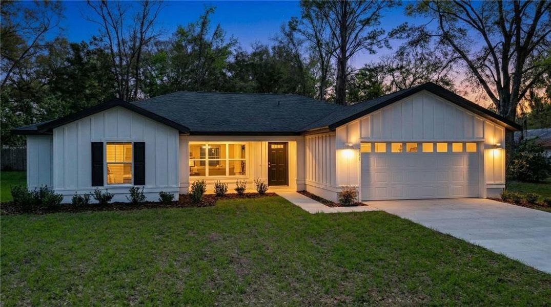 Front exterior of a new home in , Ocala, FL, highlighting curb appeal (Image 23).