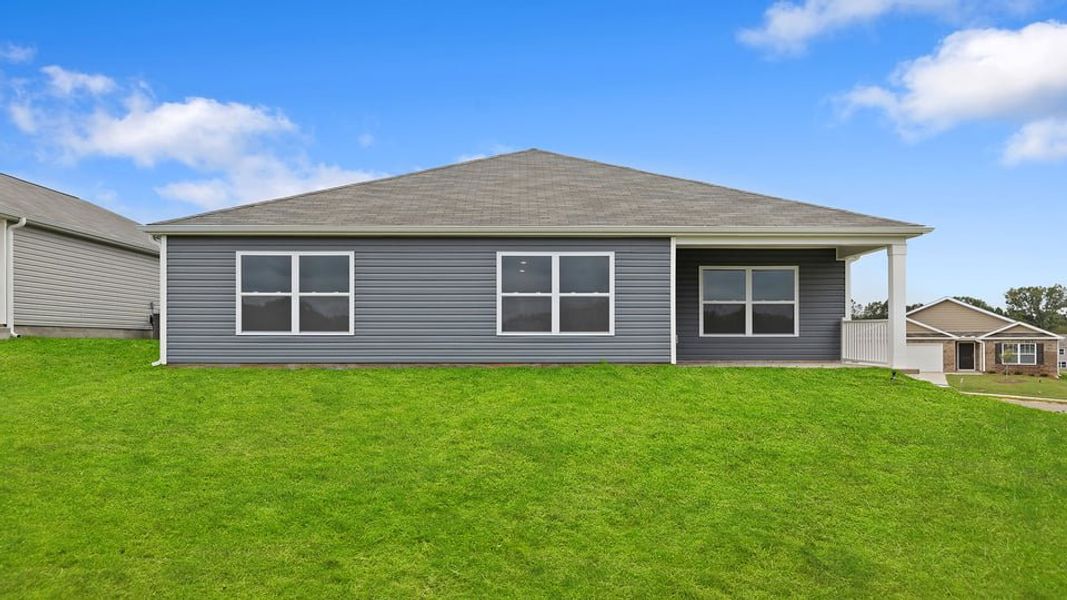 Exterior details and patio area of a home in Lakestone, Woodruff (Image 1).