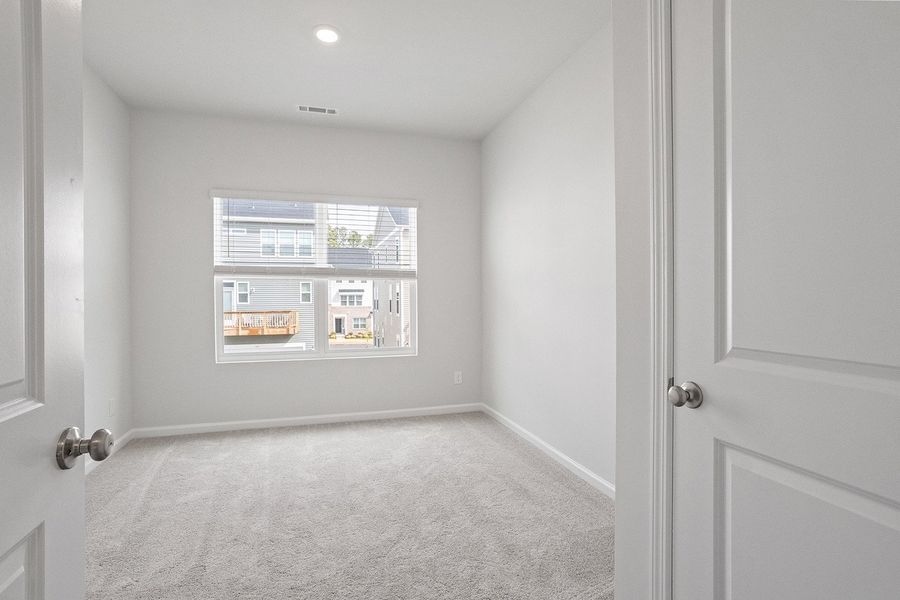 Spacious, unfurnished interior of a new home in Renaissance at White Oak, Garner (Image 23).